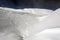 An amazing view of snow covered landscape and ski lift and a piste in the alps switzerland in winter