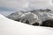 An amazing view of snow covered landscape and ski lift and a piste in the alps switzerland in winter