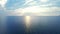 Amazing view sunlight reflecting on sea surface. Drone view blue sea on skyline