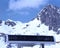 An amazing view of swiss alps and a ski lift and snowy mountains