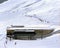 An amazing view of swiss alps and a ski lift and snowy mountains