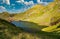 Amazing view of Transfagarasan Balea glacier lake at a bright sunny day, Romania