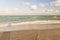 Amazing view of turquoise water of Atlantic ocean and blue sky with white clouds. Miami Beach.