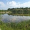 Amazing views of the lake, cliff and grassy shores