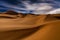 Amazing views of the Sahara desert under the night starry sky.