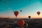 Amazing wide shot of many balloons taking off and preparing for take off in luxor egypt. Amazing view of the surrounding area at