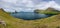 Amazing wide view of Drangarnir gate, Tindholmur and Mykines, Faroe Islands