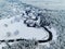 Amazing wild river in blue frozen forest. Really snowly winter on the north. Aerial panoramic view