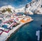 Amazing winter view from flying drone of Nusfjord town, Norway,