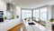 Amazingly bright kitchen in a contemporary house with a window.