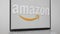 Amazon Logo and Laptop Gray Background