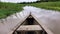 Amazon river - a wooden boat stem moving through water