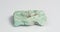 Amazonite on a white background. Exotic ornamental stone.