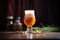 amber ale in a chalice glass, rich color, carbonation bubbles visible