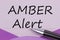 AMBER Alert written on note