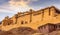 Amber Fort Jaipur Rajasthan with moody sunset sky. A UNESCO World Heritage site.