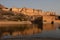 Amber Fort wth its large ramparts and series of gates and cobbled paths overlooking Maota Lake, Amer