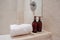 Amber glass shampoo bottles in a luxury minimalist bathroom.