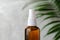 Amber glass spray bottle, close-up view. Natural organic cosmetic or herbal medicine product concept