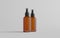 Amber Spray Bottle Mockup - Two Bottles. 3D Illustration
