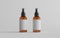 Amber Spray Bottle Mockup - Two Bottles. Blank Label. 3D Illustration