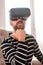 Ambitious bearded man estimating VR