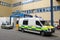 Ambulance cars in entrance of hospital