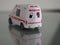 Ambulance Emergency Model white color car on mirror table reflection