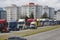 Ambulance in emergency service passing by the slow march of hundreds of trucks in a line protesting the increase in fuel prices