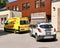 An ambulance and a police car near the reception department