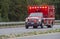 An ambulance rushes an injured or ill person to a hospital.