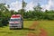 An ambulance van or a paramedic waiting for the victims in a garden