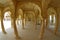 Amer, India - September 19, 2017: Collumned yellow hall in Sattais Katcheri in Amber Fort near Jaipur, Rajasthan, India