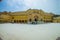 Amer, India - September 19, 2017: Some tourist visiting and taking pictures of the patio of the beautiful palace, in