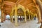 Amer, India - September 19, 2017: Unidentified people walking inside of the collumned hall in Sattais Katcheri in Amber