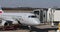 American Airline airplane after landing at GSP to the international terminal envoy ramp workers bringing the aircraft to