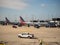 American Airlines planes sitting at airport terminal refueling