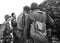 American allied soldiers in trench uniforms fight German enemies along the Gothic Line in a historical reenactment