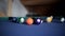 American billiard  9-ball  nine-ball pool. Man playing billiard with colorful balls