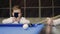 American billiard. Boy playing billiard, snooker. Little Kid takes photo