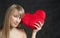 American Blond haired Woman with a Heart-Shaped