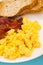 American breakfast, bacon and scrambled egg