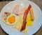 American breakfast set on a white plate
