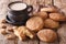 American cookies Snickerdoodle and coffee with milk close-up. Ho