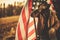 American Cowboy Rancher in Front of National United States Flag