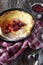 American cuisine: Dutch baby lush omelet, powdered sugar and cherry jam dressing