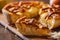 American cuisine. Homemade apple pie on wooden background. Classic autumn Thanksgiving dessert.