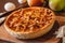 American cuisine. Homemade apple pie on wooden background. Classic autumn Thanksgiving dessert.