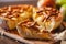 American cuisine. Homemade apple pie on wooden background. Classic autumn Thanksgiving dessert.