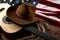 American culture, living on a ranch and country muisc concept theme with a cowboy hat, USA flag, acoustic guitar, harmonica and a